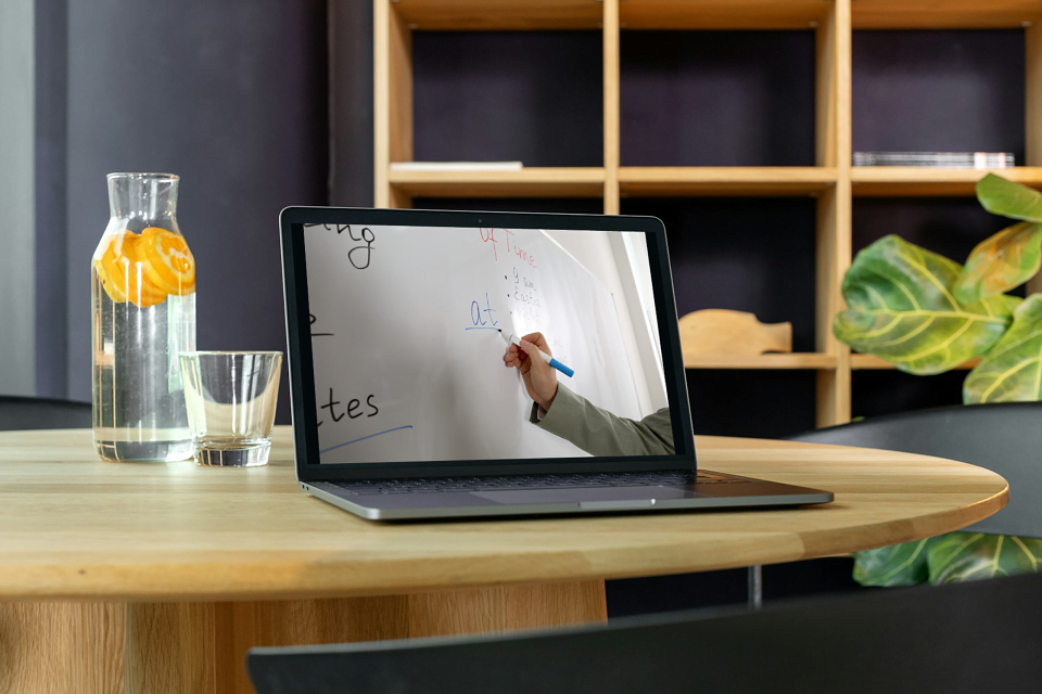 Online tutoring taking place on a laptop.